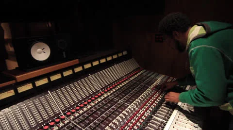 Black engineer mixing on Recording Studio board - Ew 040413 13 Stock Footage 23140183