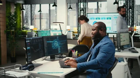 Black engineer uses artificial intelligence systems for data mining Stock Footage 313964954