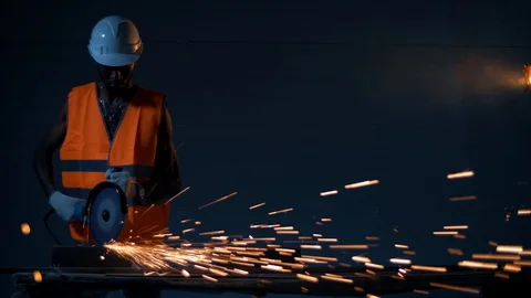 Black engineers workers work on welding metal in a dark atmosphere. Video stock 128748371