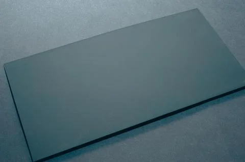 Black envelope on a black flat background, luxury corporate identity and co.. Stock Photos