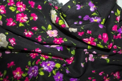 Black fabric floral pattern background texture Foto stock
