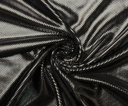 Black fabric with foil elements, wavy surface 스톡 사진