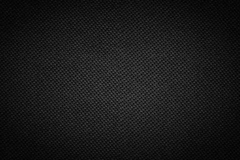 Black fabric material background texture Фото
