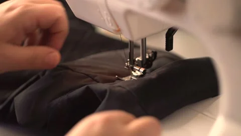 Black fabric sewing 4K Video stock 102470440