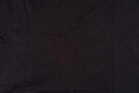 Black Fabric Texture Background With Lint And Creases Ideal For Product And.. Stock Photos
