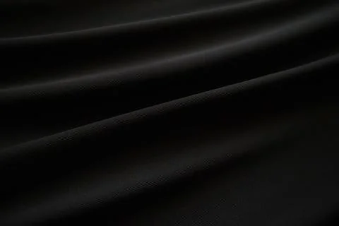 Black fabric texture background. Stock Photos