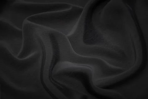 Black fabric texture background, wavy fabric slippery black color, luxury sat Foto stock