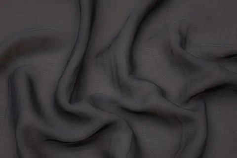 Black fabric texture background, wavy fabric slippery black color, luxury s.. Stock Photos