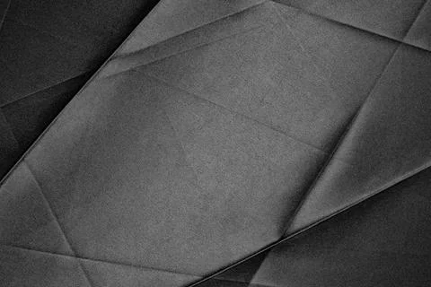 Black fabric texture featuring dynamic lines and deep shadows enhances the .. Stock Photos