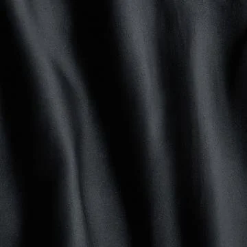 Black fabric with waves Stock Photos