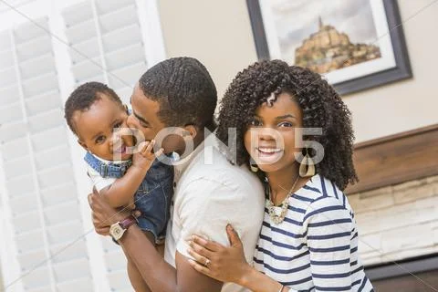Black Family Playing In Living Room