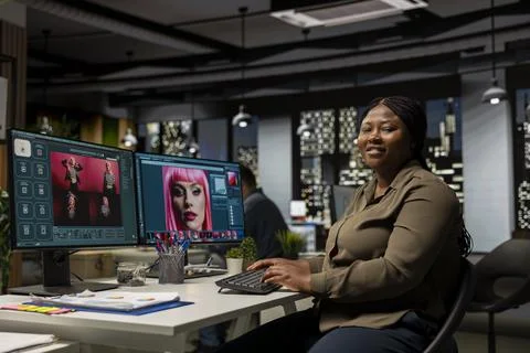 Black female editor using AI program turning text prompt into photos Stock Photos