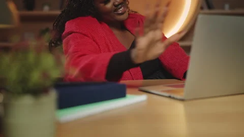 Black female freelancer completing her work and closing laptop, successful deal Stock Footage 340764319