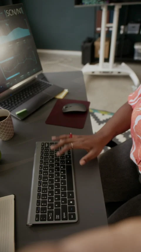 Black Female Programmer Recording Video in Modern Office Stock Footage 306845433