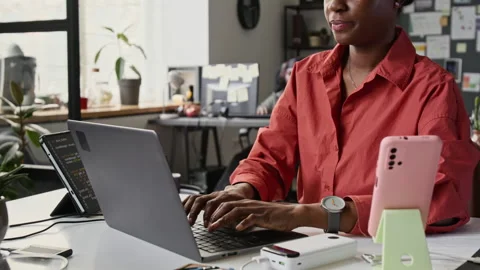 Black Female Programmer Stretching Fingers and Typing on Laptop Stock-Footage 336716673