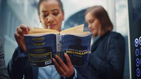 Black Female Riding Elevator Reading Book 스톡 동영상 167836548