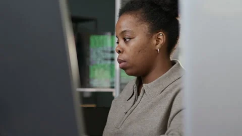 Black Female Software Engineer Working in Office Stock Footage 306839235