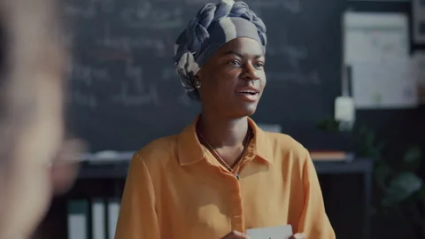 Black Female Student Explaining Word Meaning during English Class Stock Footage 295839782
