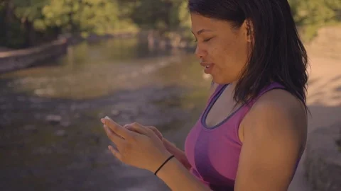 Black Female Using Cell Phone Outdoors Stock Footage 91981065