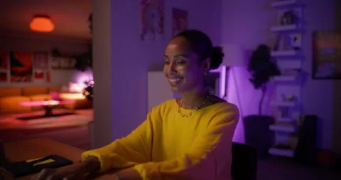 Black Female Using Laptop at Home Cinema Robot Footage Stock Footage 320883909