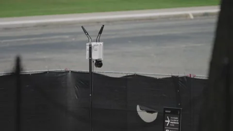 Black fencing and a security camera around the drained Reflecting Pool Video stock 345283374