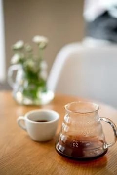 Black filter coffee on the table in cafe service kettle hario pour over cup Foto stock