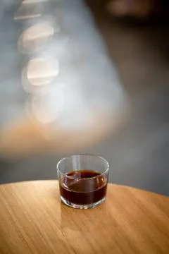 Black filter coffee on the table in cafe glass cup hario pour over cup Stock-Fotos