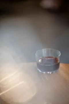 Black filter coffee on the table in cafe glass cup hario pour over cup Foto stock