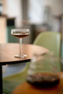 Black filter coffee on the table in cafe glass cup hario pour over cup Foto stock
