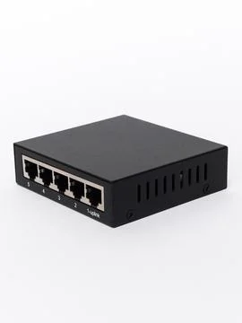Black five port network switch angled Stock Photos
