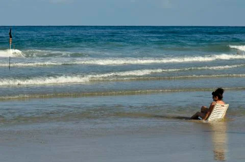 Black flag on the beach Stock Photos