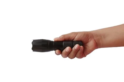 Black flashlight in human hands, isolated on a white background with the cl.. Stock Photos