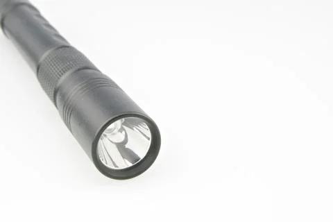 Black flashlight switch off to show front Stock Photos