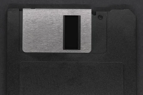 Black floppy disk on black background Foto stock