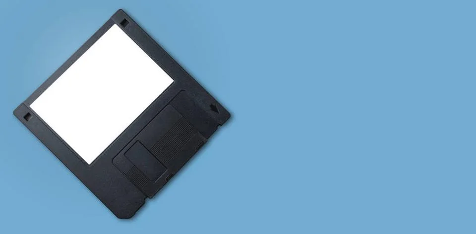  A black floppy disk with white label. A black floppy disk with white labe... Stock Photos