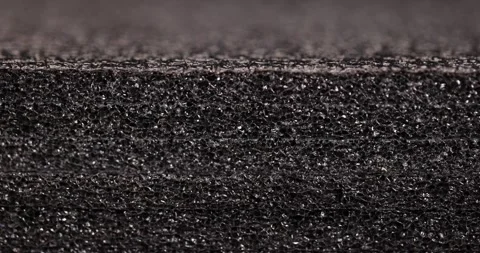 Black foam material for insulation of buildings and packaging of goods, soft Stock Footage 290286101