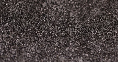 Black foam material for insulation of buildings and packaging of goods, soft Stock Footage 293048946