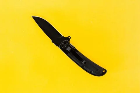 Black folding knife Stock Photos
