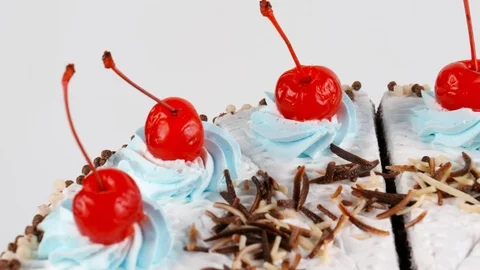 Black Forest cake with whipped cream and cherries, close-up view Stock Footage 87174819