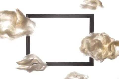 Black frame among white clouds on a white background Stock Photos