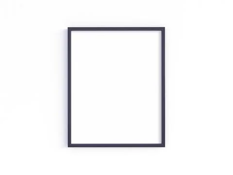 Black frame on a light wall. Stock Photos