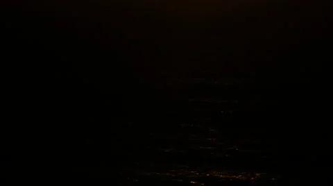 BLACK FRAME REVEALS ORANGE SUN BEHIND CLOUDS OVER OCEAN Stock Footage 59071139