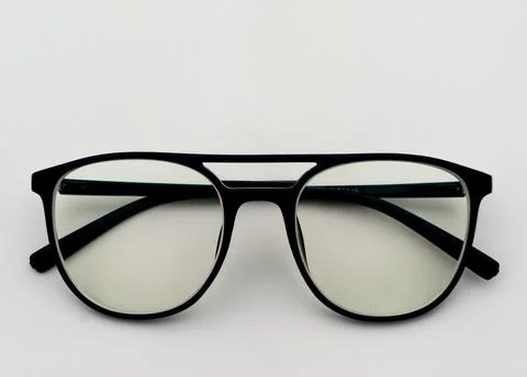 Black frame spectacles on white background Foto stock