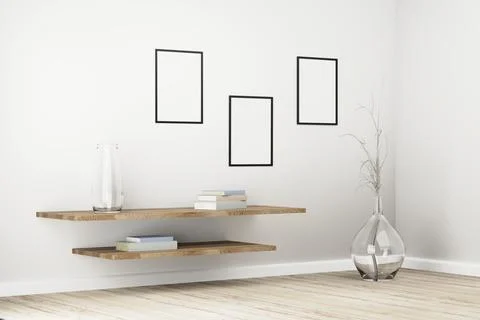 Black frames on white wall in bright interior with plants on floor in glass p Foto stock