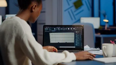 Black freelancer architect working in 3D software to elaborate container design Stock Photos