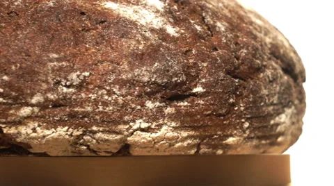 Black fresh bread moving on a stand Stock Footage 67675107