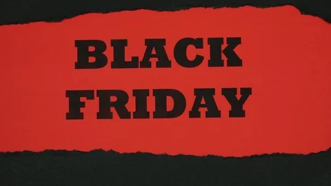 Black friday appears on red background hidden under black paper Video stock 120299432
