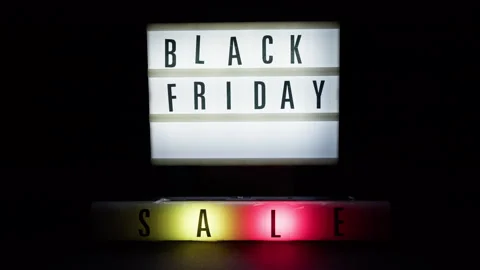 Black Friday background with red and yellow lights Video stock 254553275