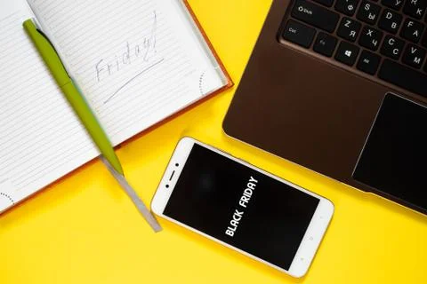 Black Friday layout computer phone watch pen Notepad. Stock Photos