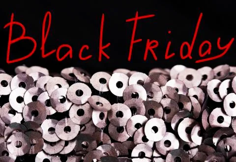 Black Friday! Sequins close-up macro. Abstract background with sequins 库存照片